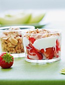 Strawberries with yoghurt and cereal clusters
