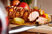 Rolled roast pork with vegetables