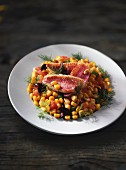 Sweetcorn salad with red mullet