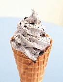 Cookies and Cream Soft Serve Ice Cream in a waffle cone