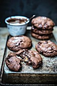 Chocolate cookies filled with caramel and soft nougat