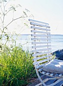 A chair by the sea.