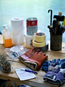 Crafting equipment & work gloves on table