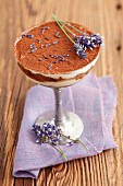 A layered dessert with Lebkuchen (spiced soft gingerbread from Germany), mascarpone and lavender flowers
