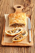 Puff pastry pasty filled with sauerkraut and fish