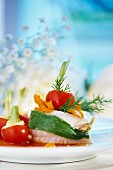 Rolled fillet of fish with tomatoes and dill