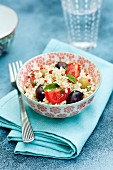 Couscous salad with olives, tomatoes and peppermint