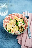 Farfalle with courgettes, peas and chilli