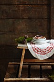 Mini pancakes with berries on a rustic wooden table