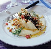 Fish fillet with tomato salsa and dill on mashed potato