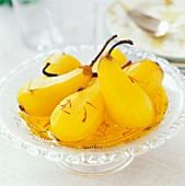 Poached pears in saffron sauce