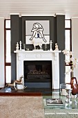 Modern artwork above traditional fireplace in classic, modern interior