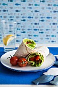 Wraps with fish and tomatoes