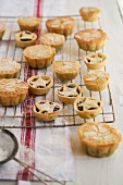 Mince pies on a cooling rack for Christmas