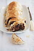 Chocolate strudel, partly sliced