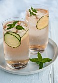 Rock Shandy cocktail with Angostura bitters, cucumber and mint