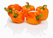 Five orange peppers