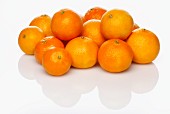 Several whole clementines