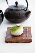 Wagashi nightingale (for New Year) with a teapot (Japan)