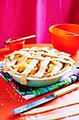 Peach pie in a pie dish