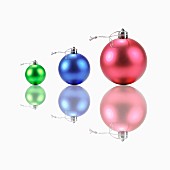 Three Christmas tree baubles (red, blue, green)