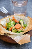 Carrots with summer vegetables in a pastry bowl