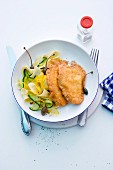 Turkey schnitzel with ribbon pasta and courgette