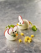 Boiled egg mice with radish slices for ears