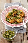 Baked potatoes with herb & caper gremolata