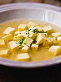 Soup with custard royale and chives