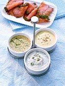 Mustard sauce, cheese sauce with green peppercorns, and a mustard & dill sauce, served with smoked salmon