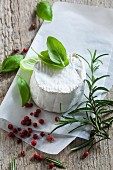 Goat's cheese with basil, rosemary and red peppercorns