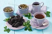 Blackberry leaf tea and fresh blackberries