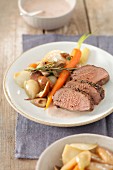 Roast fillet of venison with rosemary, vegetables and porcini mushrooms