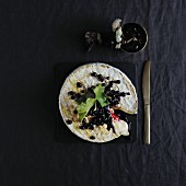 Brie with blackcurrants