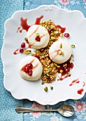 Panna cotta with pistachios and pomegranate seeds