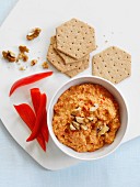 Pepper and walnut dip with crackers
