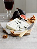 Roquefort with walnuts and figs, a glass of red wine