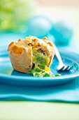 Mini pie with pea & broccoli filling, for Easter (sliced open)