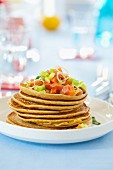 Wholemeal pancakes with salmon and cucumber salad