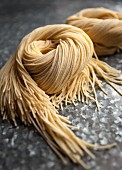 Nests of fresh angel hair pasta