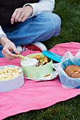 Eating Outside; Popcorn, Crudite and a Bagel Sandwich