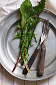 Dandelion Greens on a Rustic Place Settting