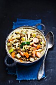 Lentils with spaetzle, sausage and carrots