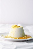Coconut panna cotta with curry sugar