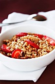 Bowl of organic granola with strawberries