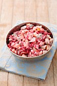 Herring salad with beetroot, apple and egg