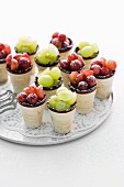 Cup-shaped tartlets filled with zabaglione and grapes