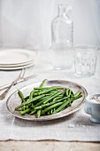 Green beans on a silver plate