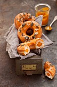 Halloween doughnuts with pumpkin purée and pumpkin seeds